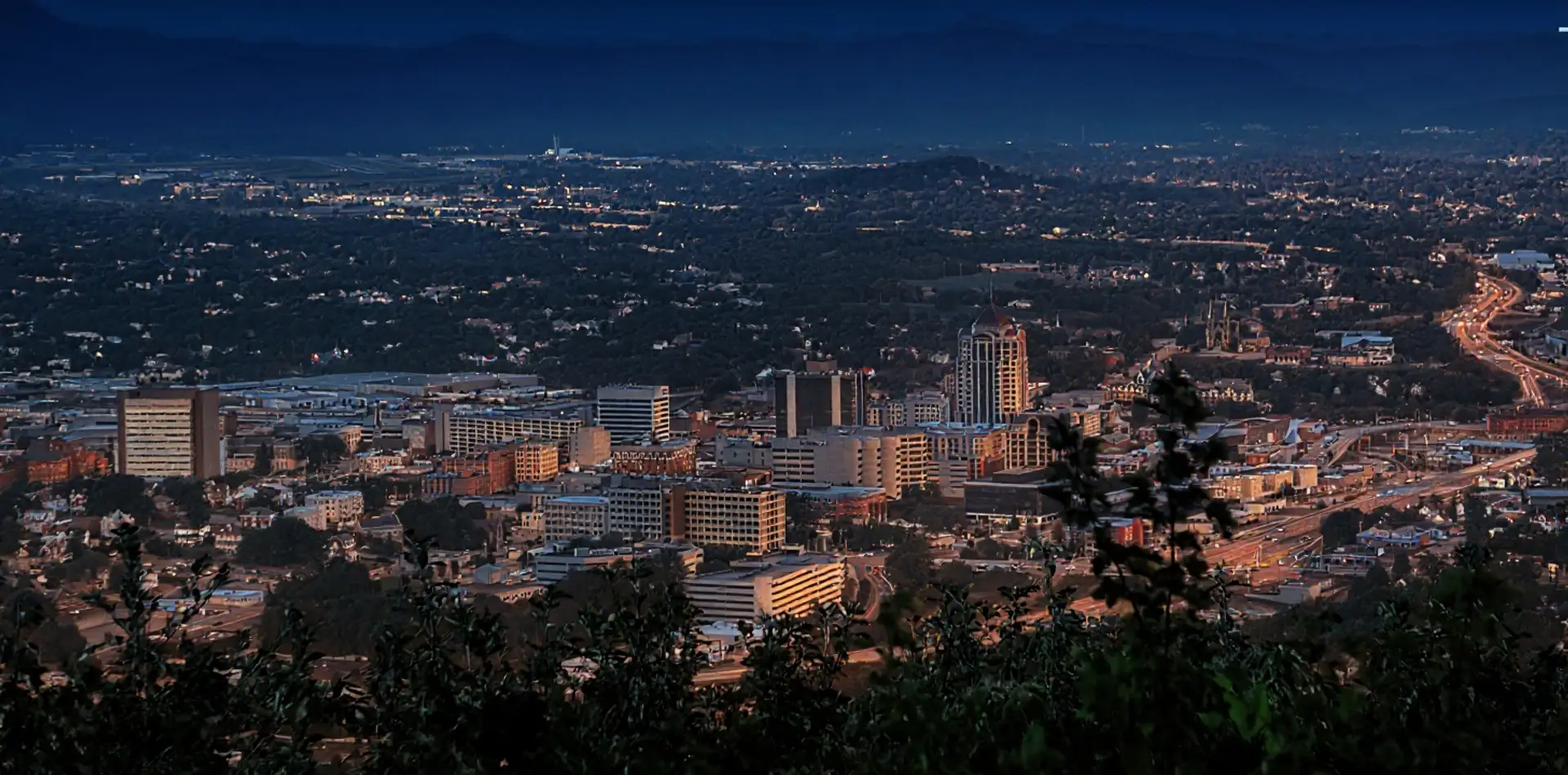 Downtown Roanoke and the Blue Ridge Mountains at sunset, seen from Mill Mountain